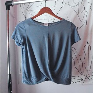 Blue Cropped t-shirt.